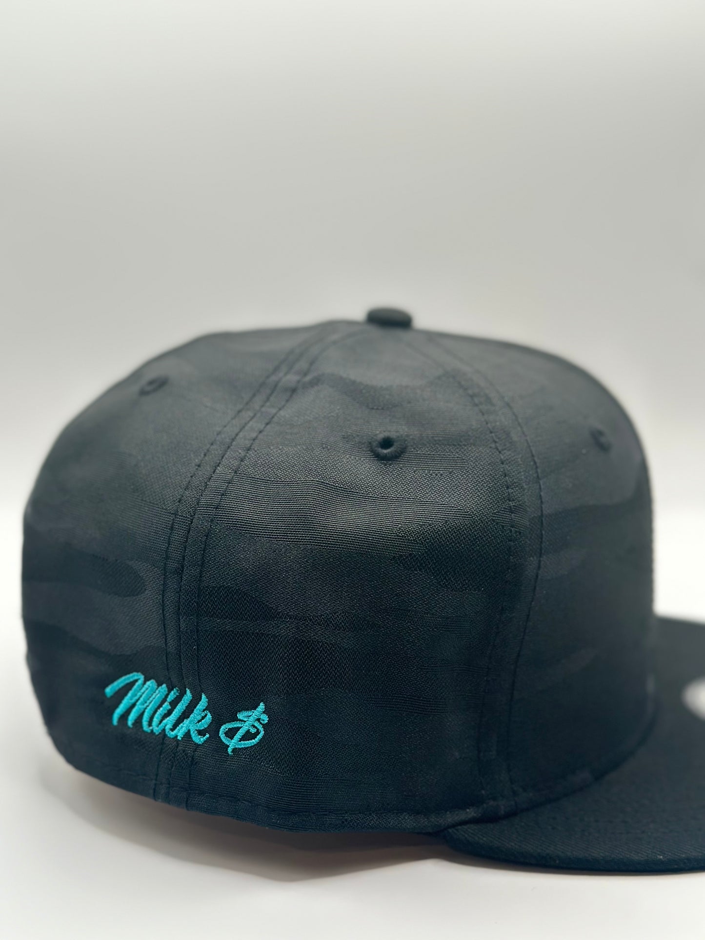 Black camouflage snapback hat